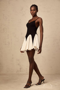 Justine color-blocked godet pleated mini dress