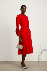 Aurelia red long-sleeve dress with floral embellishments
