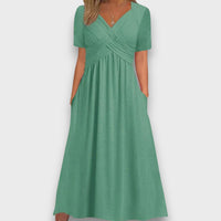 Enyelle – Dress with Delicate Wrap Look