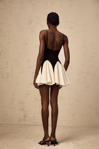 Justine color-blocked godet pleated mini dress