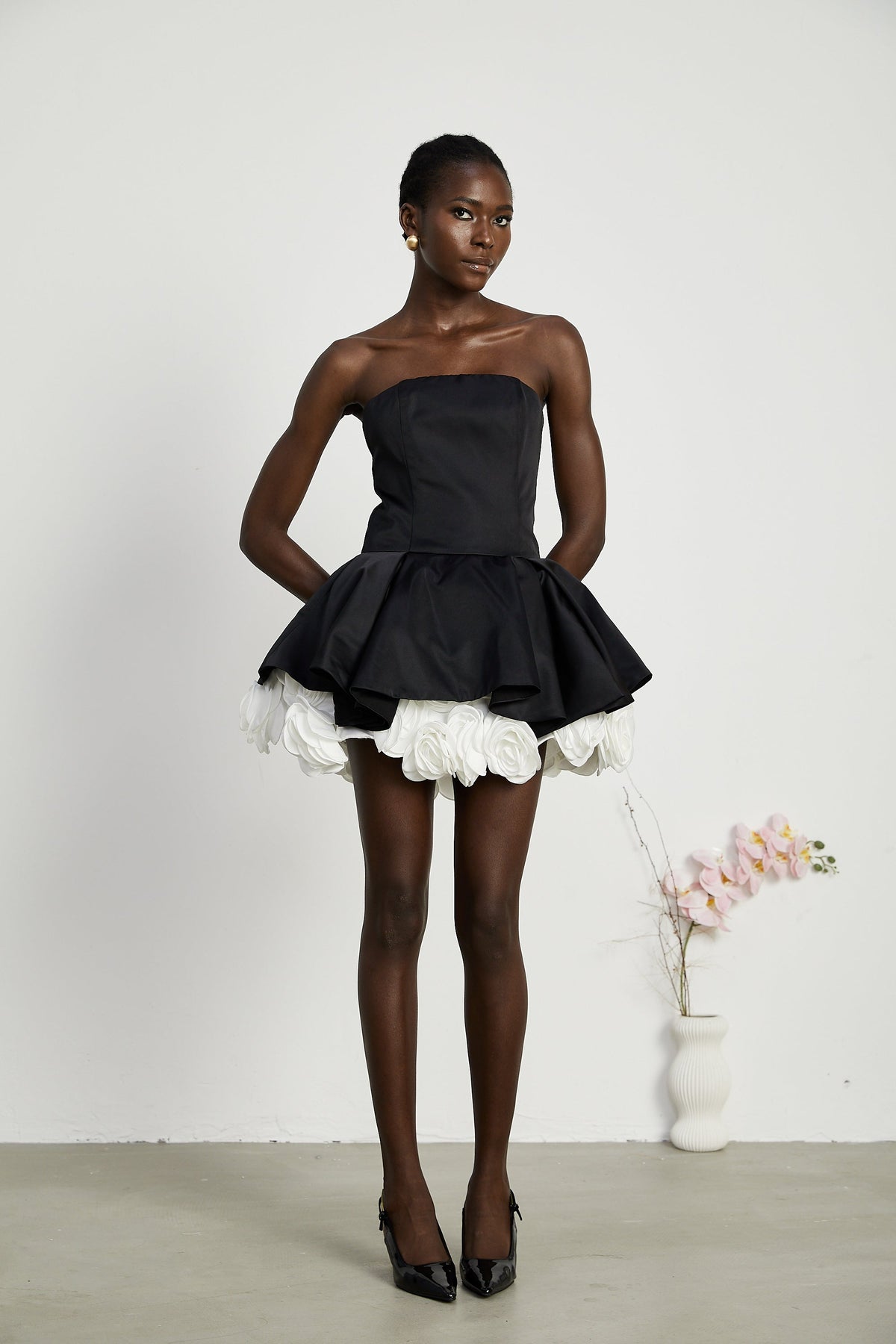 Lucie black petal-layered strapless corset mini dress