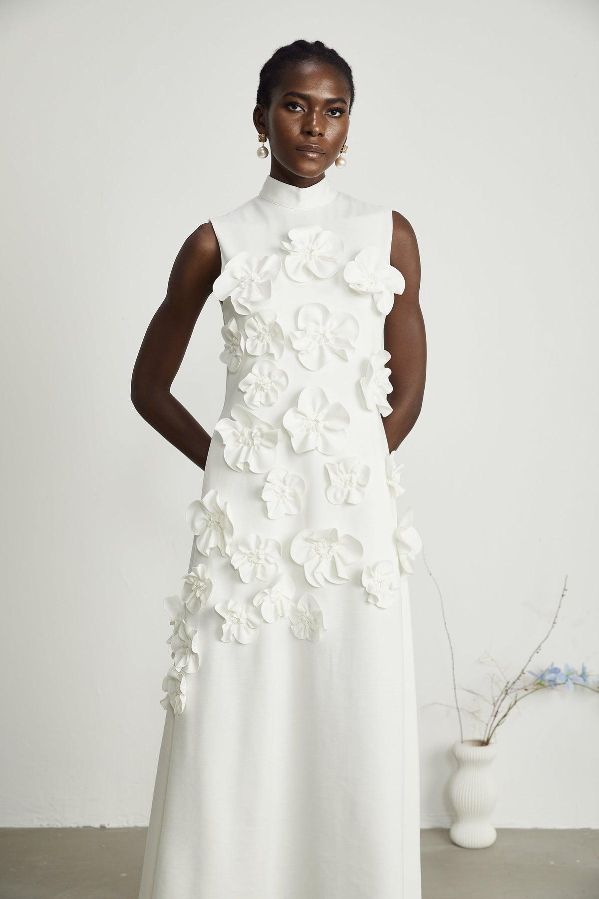 Magali White Sleeveless Maxi Dress with Faux Flower & Bow-Tie Embellishment