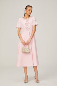 Cassiopeia crystal-accented pink bow midi dress