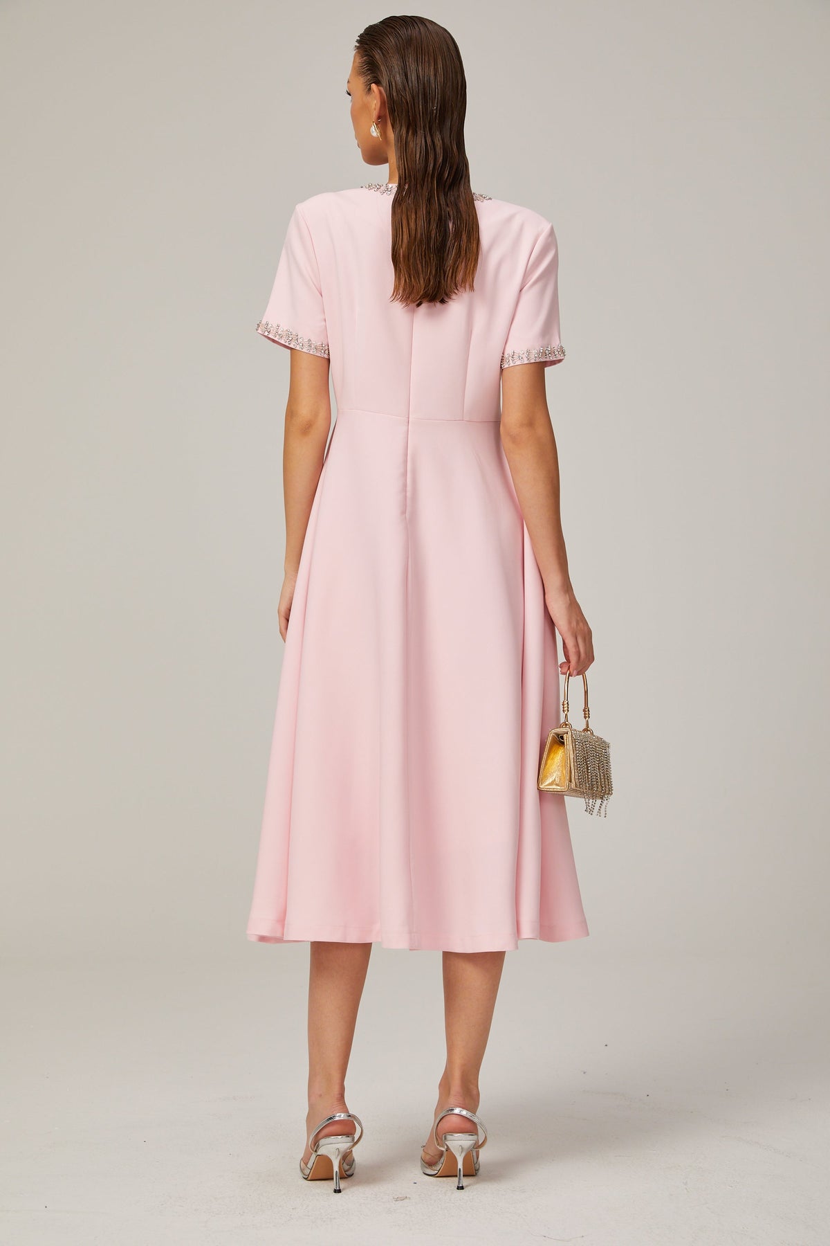 Cassi crystal-accented pink bow midi dress