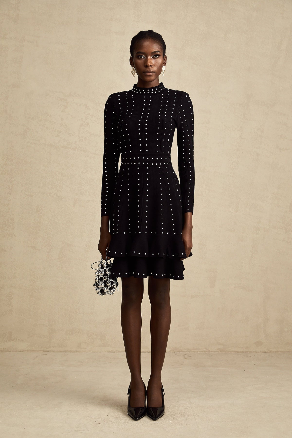 Fabienne black embellished ruffled knitted mini dress