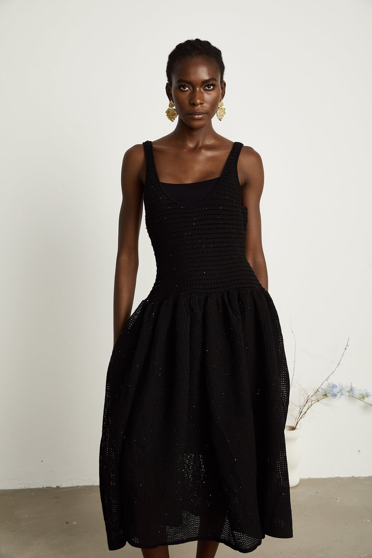 Clotilde black crochet-knit midi dress