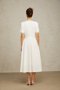 Cassiopeia crystal-accented bow midi dress in White
