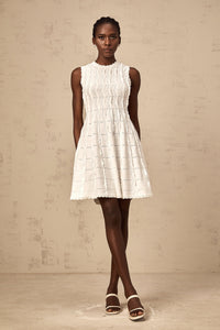 Esmée white ruffled sleeveless knit mini dress