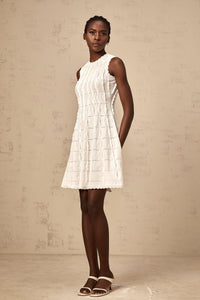Esmée white ruffled sleeveless knit mini dress