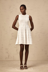 Esmée white ruffled sleeveless knit mini dress