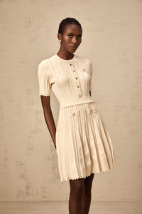 Amélie neutrals pointelle-trim pleated knit mini dress