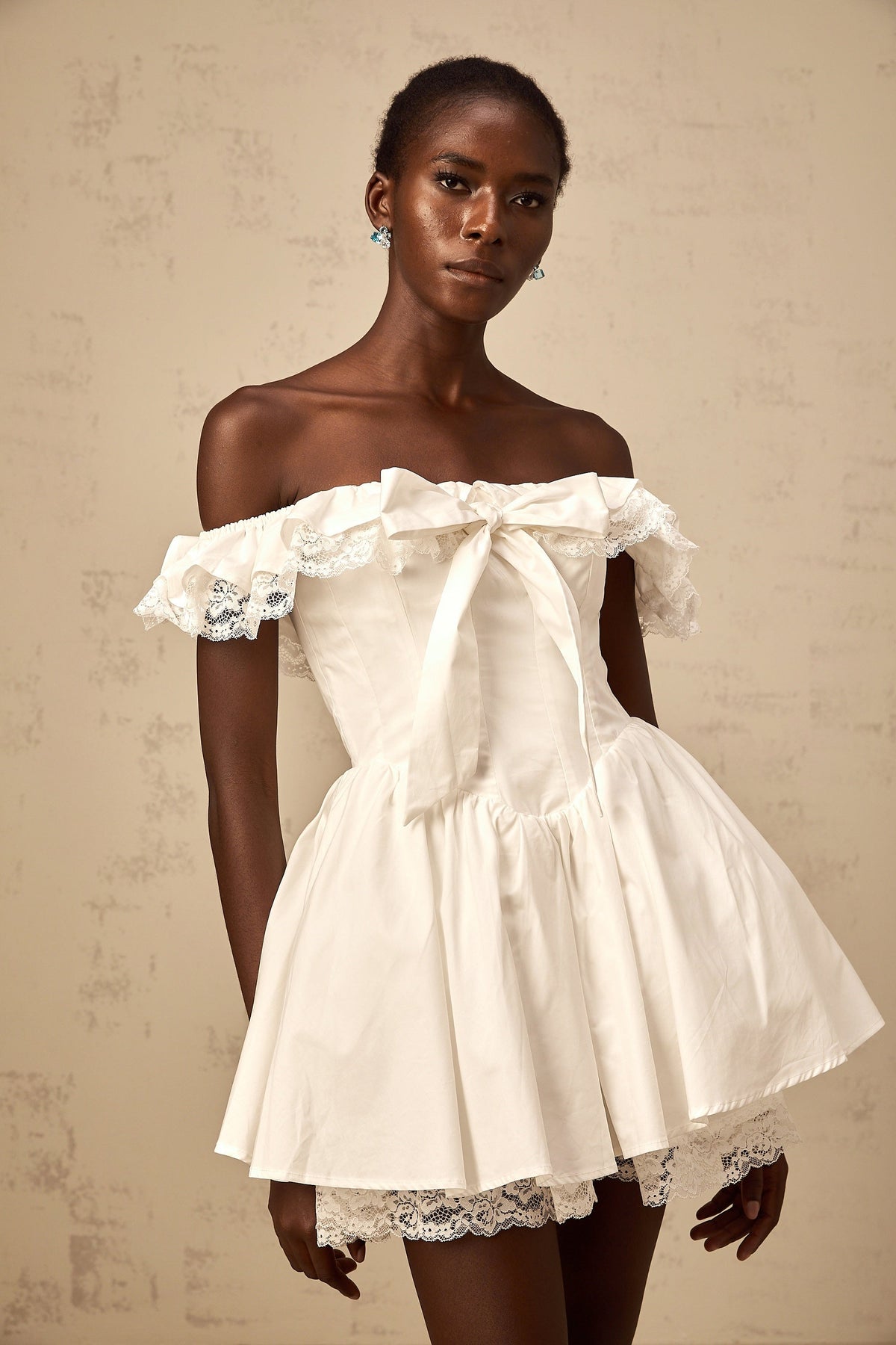 Arsène white oversize-bow ruffled mini dress