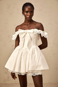 Arsène white oversize-bow ruffled mini dress