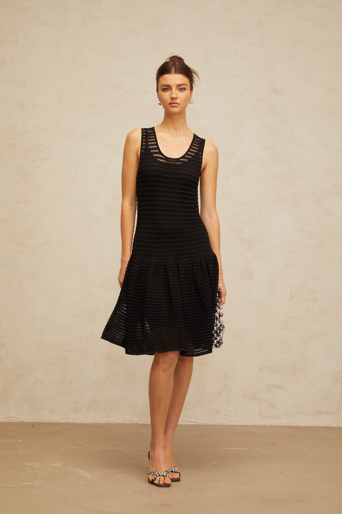 Maelle black flounced pointelle-knit mini dress