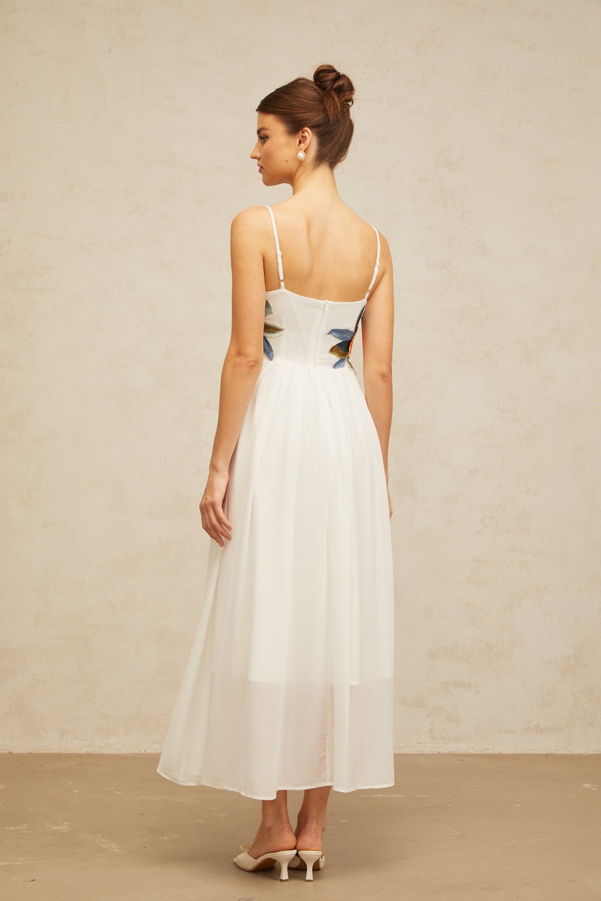 Josette floral-embroidered shirred maxi dress in White