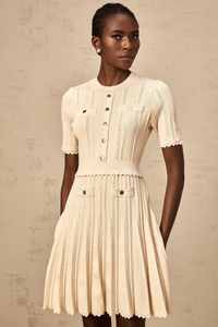 Amélie neutrals pointelle-trim pleated knit mini dress