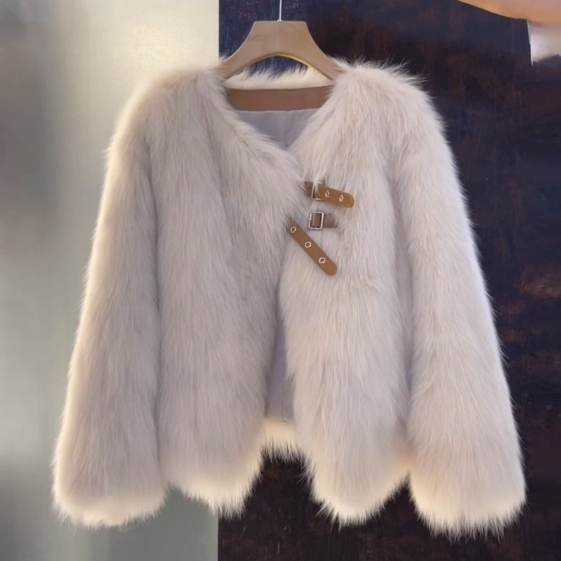 Vogue brown V-neck leather and fur coat