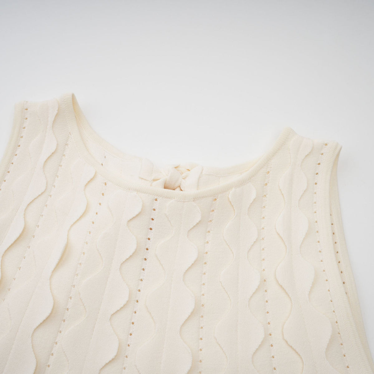 Axelle white wavy-detail sleeveless mini dress