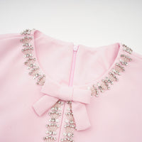 Cassi crystal-accented pink bow midi dress