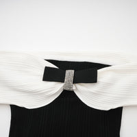 Angèle black off-shoulder knitted mini dress