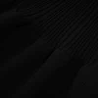 Angèle black off-shoulder knitted mini dress