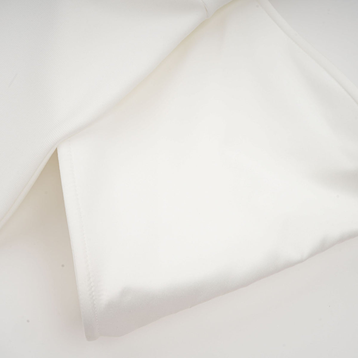 Capucine white oversize-bow bandage dress