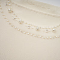 Donatienne white faux-pearl knitted maxi dress
