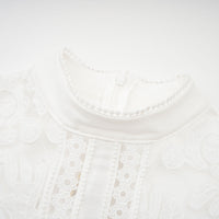 Madeleine white panelled embroidered midi dress