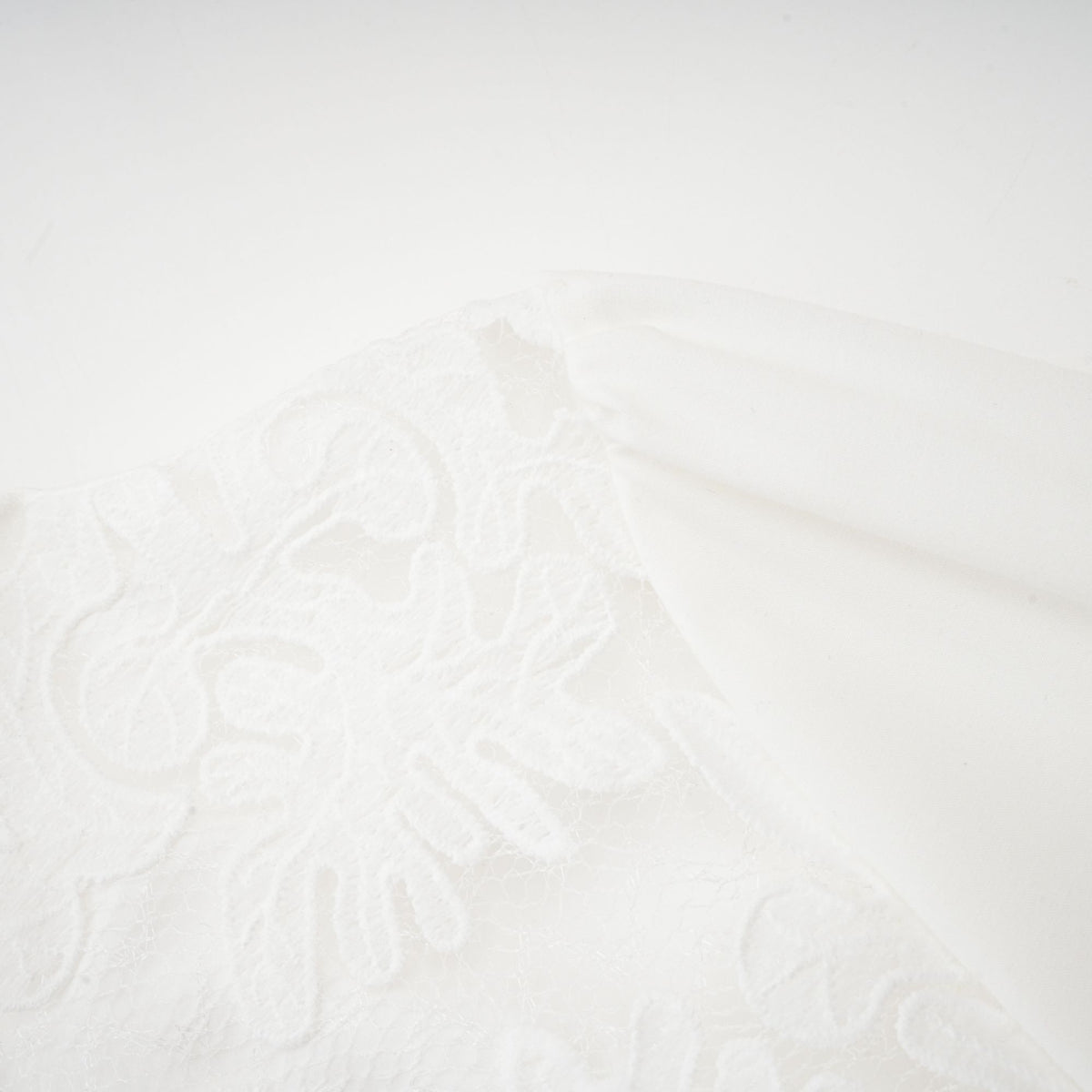 Madeleine white panelled embroidered midi dress