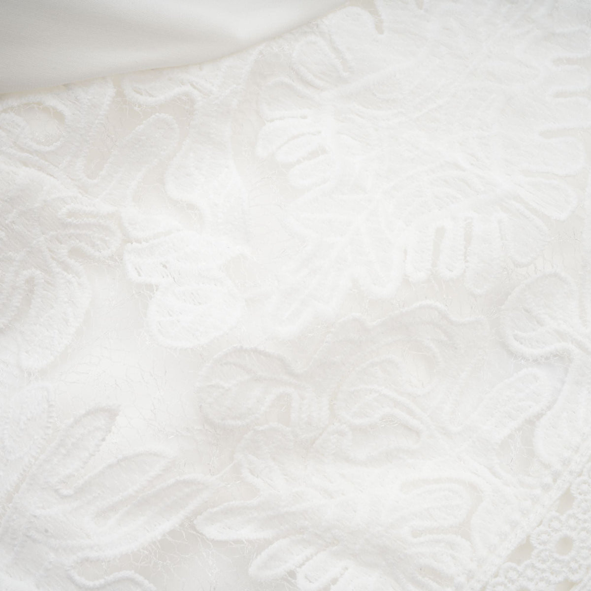 Madeleine white panelled embroidered midi dress