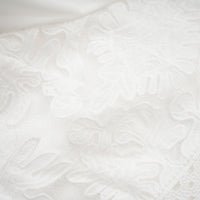 Madeleine white panelled embroidered midi dress