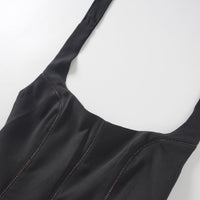 Quirine halterneck bow-detail mini dress in Black