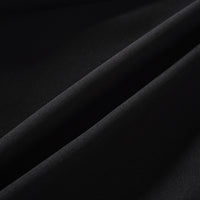 Quirine halterneck bow-detail mini dress in Black