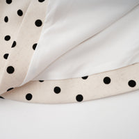 Geneviève neutrals polka-dot puff mini dress