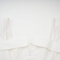Julie white folded-neck bonded sleeveless mini dress