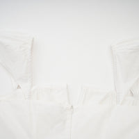 Julie white folded-neck bonded sleeveless mini dress