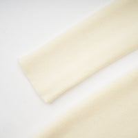 Émeline white knitted pleated midi dress