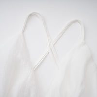 Quincie white shirred flounced mini dress
