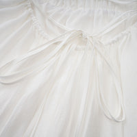 Quincie white shirred flounced mini dress