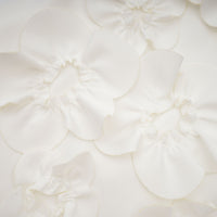 Magali White Sleeveless Maxi Dress with Faux Flower & Bow-Tie Embellishment