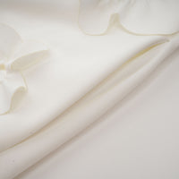 Magali White Sleeveless Maxi Dress with Faux Flower & Bow-Tie Embellishment