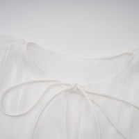 Mahault white pleated glitter-effect mini dress