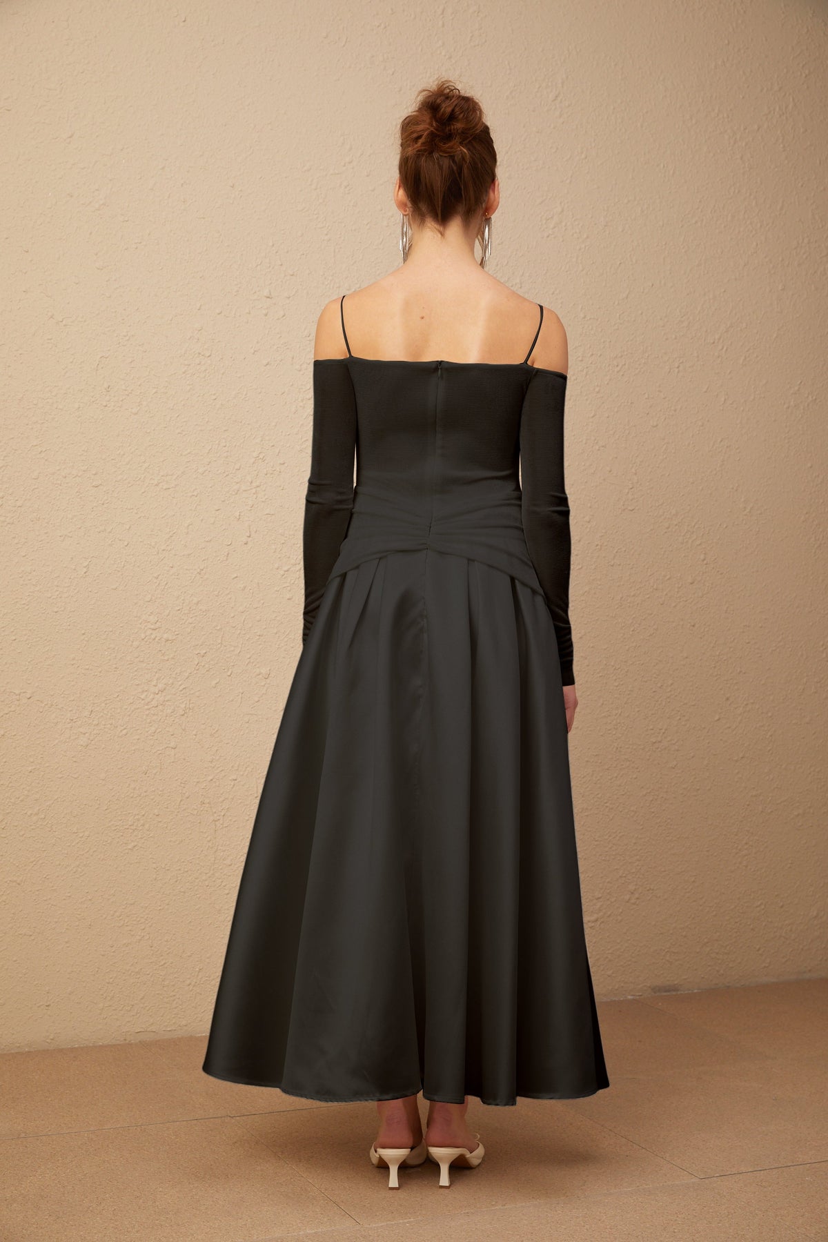 Nadine off-shoulder panelled maxi dress in Black