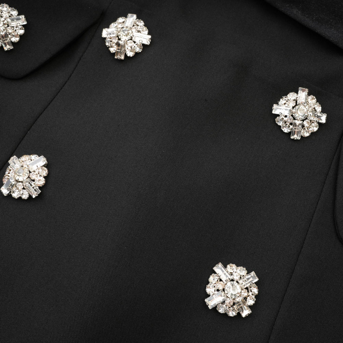 Mealla black crystal-button flared mini dress