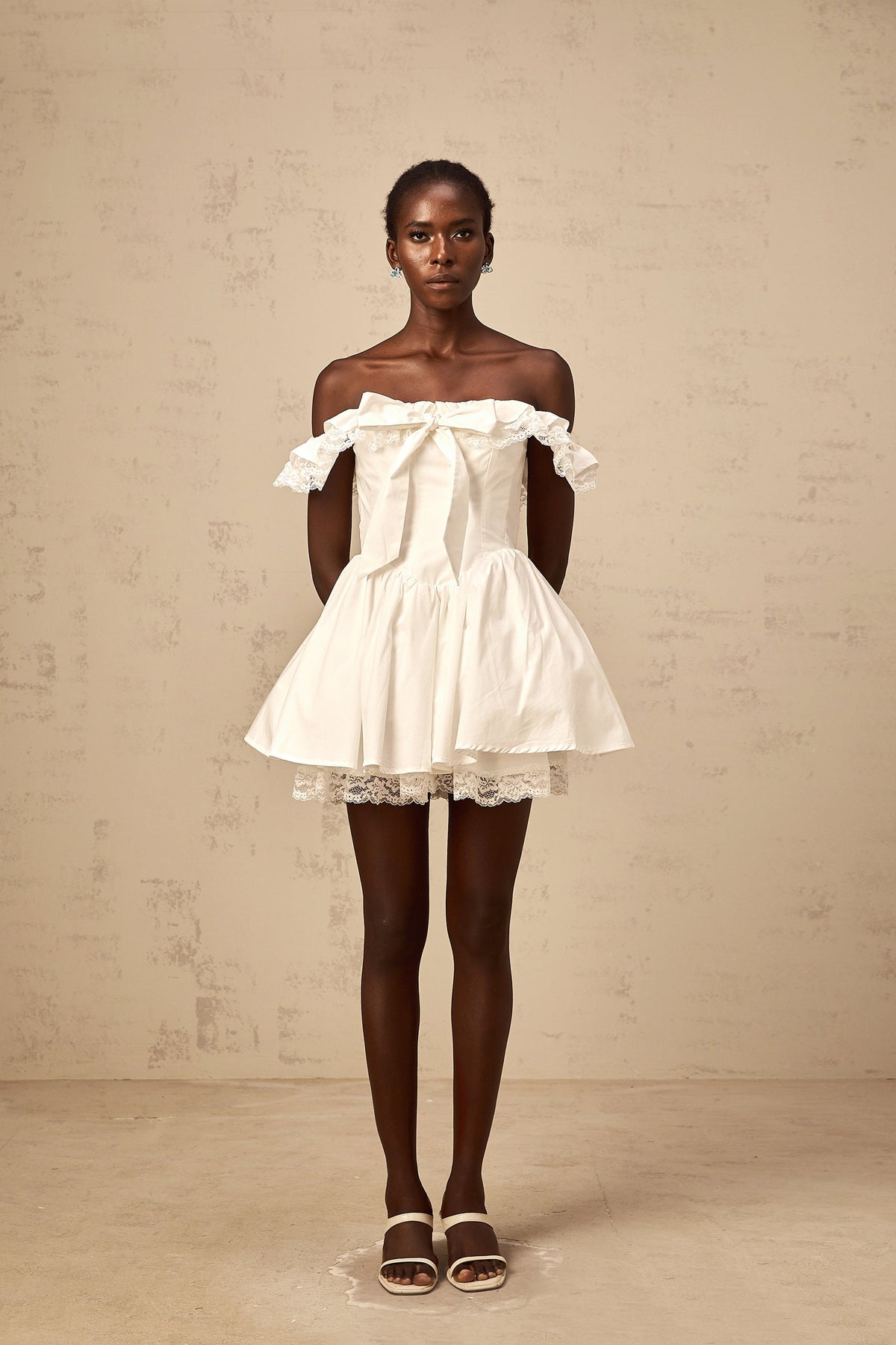 Arsène white oversize-bow ruffled mini dress